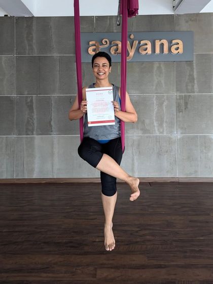 A simple, elegant pose from a new graduate, showcasing the confidence gained during our aerial course.