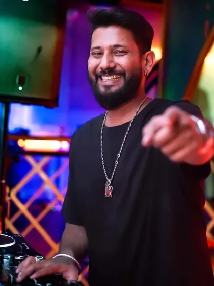 Pointing at the camera, inviting you to the party. Be your own reason to smile.