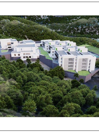 This rendering shows the school in Kangra surrounded by dense forest. Our design prioritizes harmony with the environment, creating an inspiring place for education.