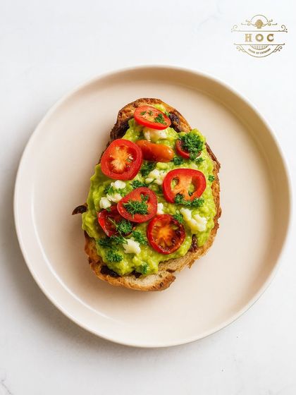 A timeless classic, our avocado toast is prepared with perfectly ripe avocados on artisanal bread. Topped with sweet cherry tomatoes and fresh parsley, it is a simple yet sophisticated offering for brunches and daytime events.