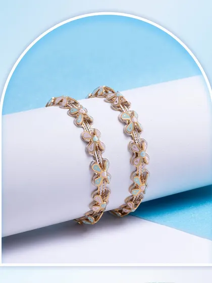 This pastel enamel bangle with a stunning rhodium finish is the perfect blend of sophistication and charm. The delicate butterfly motifs make it a whimsical yet elegant piece.