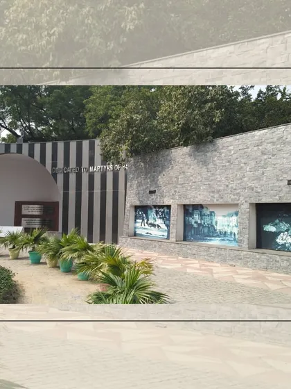 A different perspective of the Sikh Genocide Memorial, showing the entrance dedicated to the martyrs of 1984. The stone and striped marble design elements are significant choices that I deconstruct in my analysis of the memorial's spatial language.