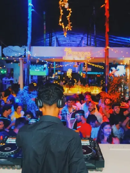 My view from the DJ booth, looking out over a packed dance floor at Tito's. This perspective is where I gauge the crowd's energy and decide which track to drop next.