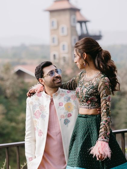 A cute couple portrait at their destination carnival event.