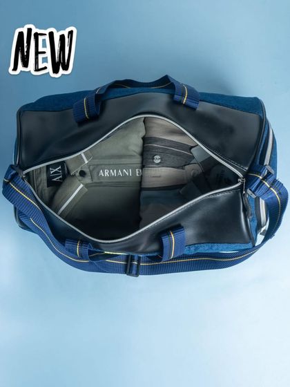 This new denim and leather sports bag is spacious enough for a change of clothes and more. It's ideal for gym, swimming, or a day picnic.