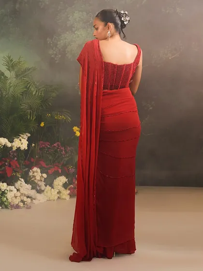 The back view of the Stardust Saree Set, highlighting the structure of the corset blouse and the simple, elegant fall of the saree.