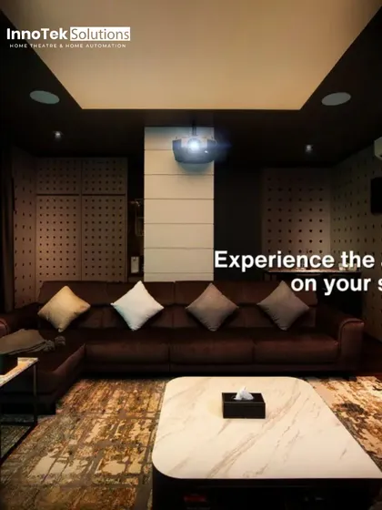 Feel the immersive power of a professionally installed system. This view highlights the ceiling-mounted projector and acoustically treated walls that make you feel part of the action.