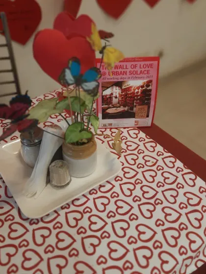 Even the smallest details are infused with love. A table setting with heart-patterned linen, ready for a special meal.