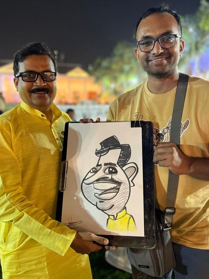 Here I am with another satisfied guest at the Ambegaon wedding. The positive reactions make every event worthwhile.