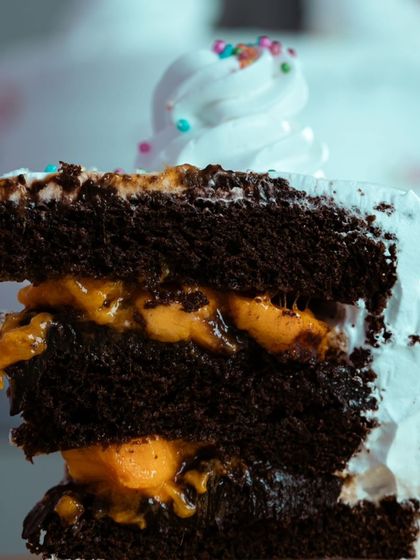 A cross-section of the delicious chocolate mango cake made using our homemade premix. Look at those fluffy layers.