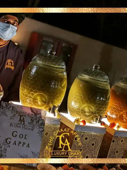 Our elegant Gol Gappa setup features illuminated honeycomb glass jars for our flavored waters. This presentation is designed to be both classy and minimalistic, ensuring the focus remains on the authentic, royal taste of the chaat.