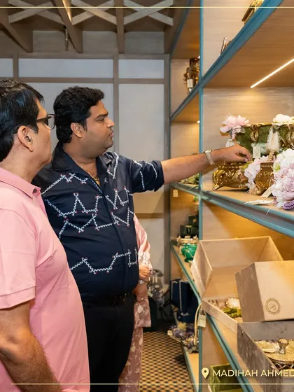 A client consultation in progress at the Ahmedabad store launch. I am explaining the details of a particular hamper, showcasing the personal and bespoke service I offer to every client.