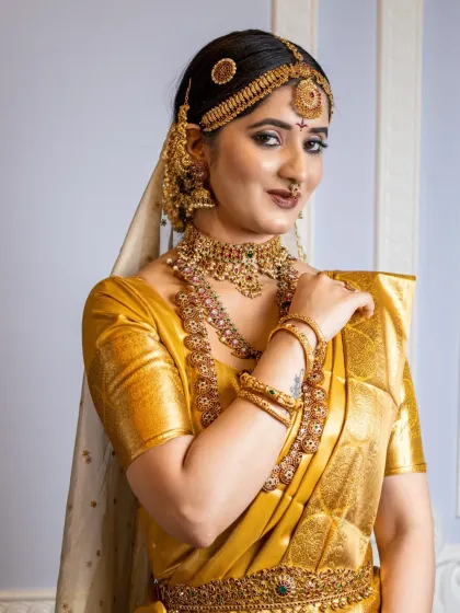 Another stunning example of my student's work, showcasing a beautiful smile and perfectly applied bridal makeup.