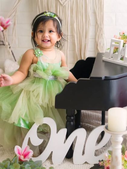 Miss Onederful indeed. This sweet girl's happy smile makes this first birthday session with a miniature piano absolutely perfect.