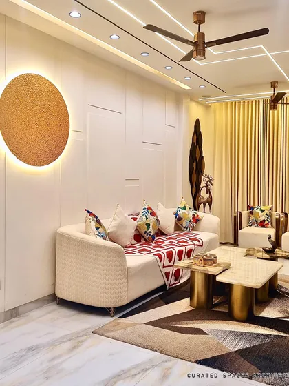 This view highlights the comfortable seating arrangement and the warm, inviting atmosphere created by the combination of soft fabrics, ambient lighting, and carefully chosen decor.