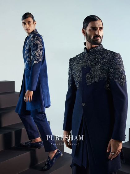 Another view of my regal blue jackets. The contrast between the two embroidery styles shows how I can create a unified yet distinct look for a groom and his party.