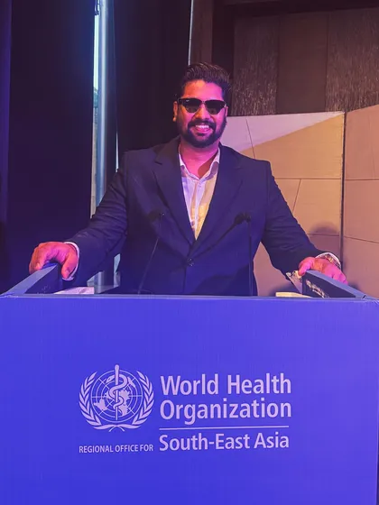 At the podium during the World Health Organization conference. It was a privilege to stand before global health leaders and use my art to advocate for a cause that affects all of humanity.