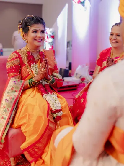A candid moment during the wedding ceremony, her smile is infectious.