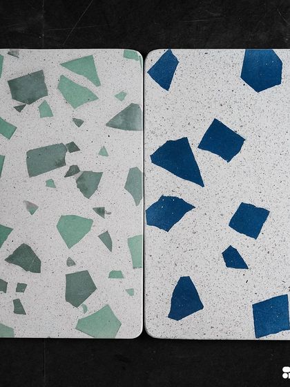 A top-down view of our new blue and green Venetian terrazzo tiles, perfect for adding a pop of color to floors, walls, or countertops.