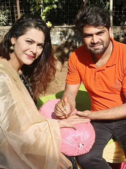 With the lead actor from the "Ek Thi Begum" series. We provide on-location mehandi services for celebrities, ensuring they look perfect for their shoots and events.