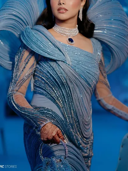 A close-up detail of Darin's incredible Gaurav Gupta gown. The intricate textures, the flowing lines, and the stunning jewelry all come together in this high-fashion bridal shot from her Dhaka wedding.