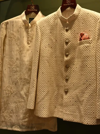This isn’t just fabric; it’s your narrative. A pairing of an embroidered kurta and a textured jacket, crafted with intention and designed to resonate as a key part of your wedding story.
