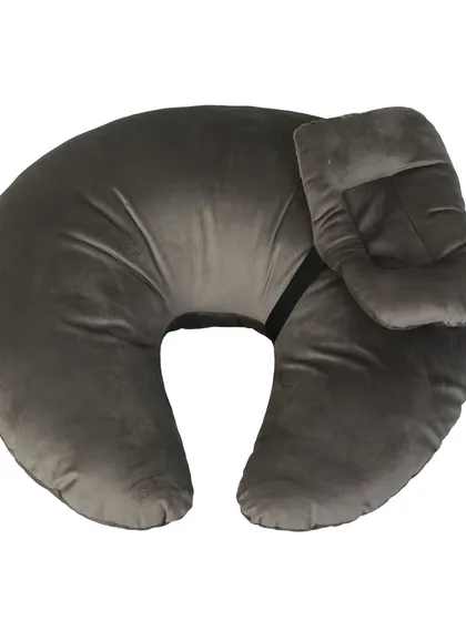 A grey nursing and feeding pillow for mothers, shot on a white background.