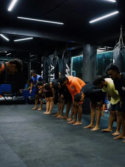 The class bows in respect, a tradition we uphold in every session.