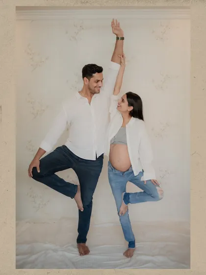 Maternity sessions can be playful too. I always encourage couples to have fun and let their personalities shine, like with this lighthearted yoga pose that brought out genuine smiles.