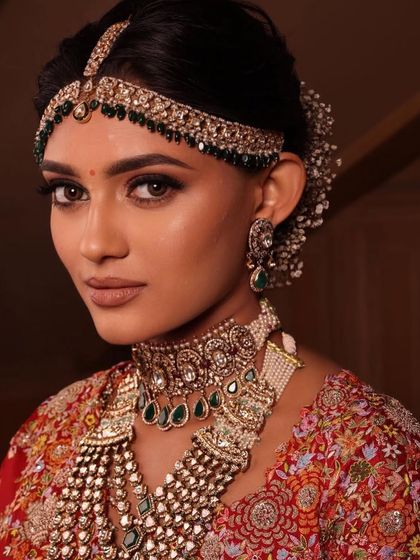 A close-up of the same regal bridal look, showcasing the flawless skin and the beautifully blended eyeshadow. This is my signature approach to creating a polished finish.