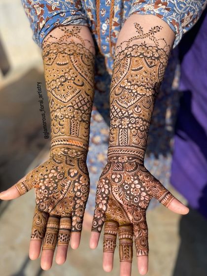 Another example of a full bridal design, showcasing detailed work on the palms and forearms. My smooth henna paste allows for these clean, consistent lines.