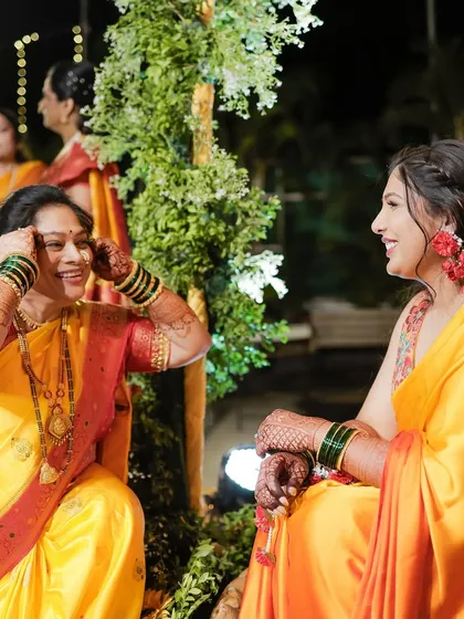 A heartwarming moment between the bride and her mother during the Haldi ceremony.