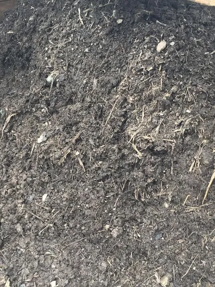 This is the pile of unsifted compost waiting to be processed. Getting through this pile is the motivation behind the endless sifter repairs and redesigns.