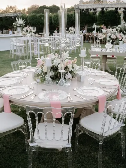 This is the magic we create. An elegant outdoor dining setup for a destination wedding in Antalya, Turkey, where every detail, from the floral centerpieces to the seating, is designed to create a breathtaking atmosphere.