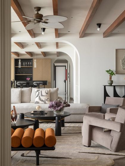 I fall madly in love with each project, and it shows in the outcome. This angle captures the harmonious arrangement of furniture and the beautiful contrast between the dark, sculptural coffee tables and the light, airy room.