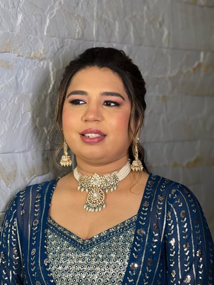 A close-up of the client enjoying her event in the rented pearl choker. It shows how comfortable and stylish my rental pieces are for any celebration.