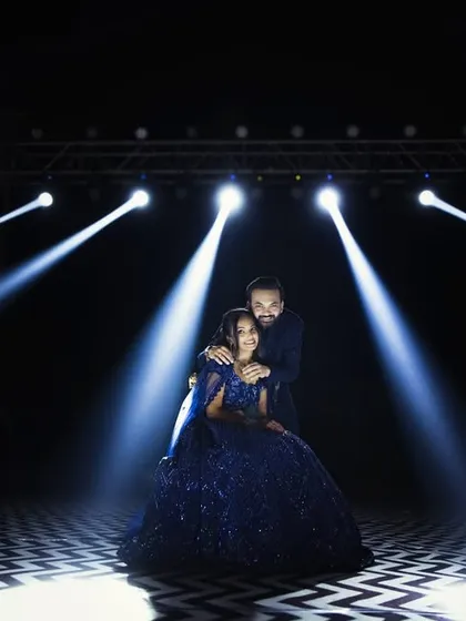 For couples who want a touch of Bollywood glamour, we can create a high-energy, cinematic scene. Using dramatic stage lighting, we can craft a pre-wedding photo that feels like your very own movie poster.