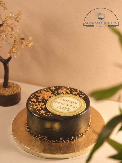 A mini version of our New Year's chocolate truffle cake. This 350gm cake is perfect for a smaller, more intimate celebration to welcome 2025.