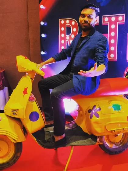 Having some fun with the decor at a retro-themed event. I fully embrace the theme to add to the overall experience.