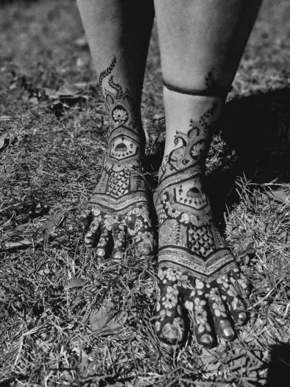 A black and white version of the bridal feet mehendi, which emphasizes the bold patterns and intricate details.