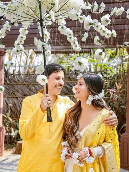 A sweet moment between the bride and her father during the Haldi ceremony. We help create the space for these beautiful, emotional memories to happen naturally.