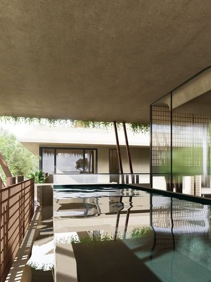 The pool at The Sanctuary is located on an upper floor, surrounded by a screen of angled timber posts. The water reflects the sky and the unique structure, creating a serene and private swimming experience.