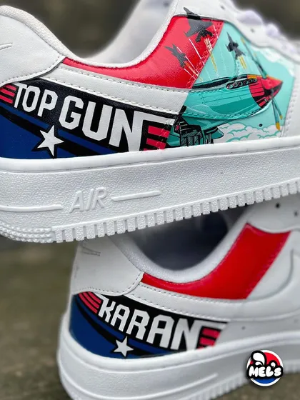 A view of both shoes from our Top Gun custom set. One shoe features the movie logo, while the other is personalized with the client's name, "KARAN," in the same font.
