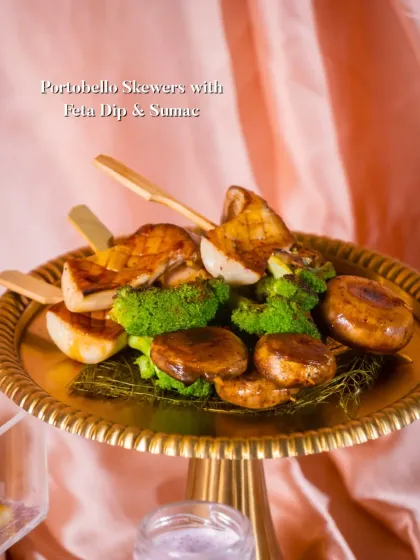 Grilled Portobello Skewers served with a Feta Dip and a sprinkle of Sumac. These vegetarian skewers are a hearty and flavorful option for grazing tables and parties.