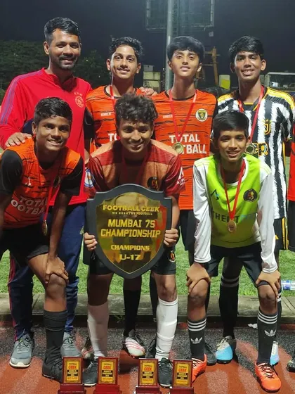 Our U17 team, champions of the Mumbai 7s Championship Cup, standing proud with their shield.