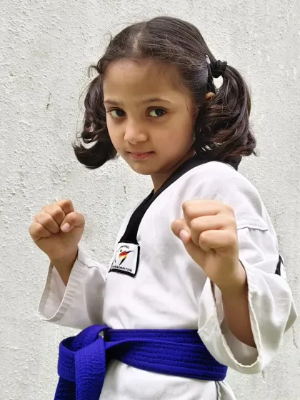 Zainab Shaikh, a true warrior. This portrait captures the focus and confidence of a district champion.