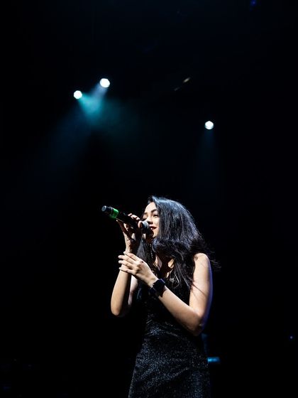 Another angle from a concert performance. I'm comfortable commanding a large stage and engaging with thousands of people.