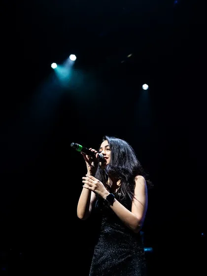 Another angle from a concert performance. I'm comfortable commanding a large stage and engaging with thousands of people.