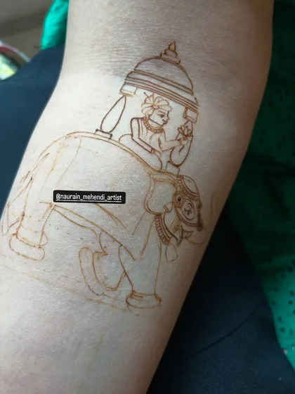 The next stage in creating the royal baraat scene, with the groom's figure outlined on the elephant.