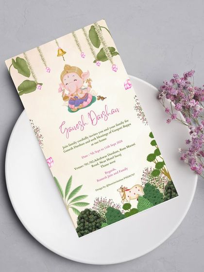 A soulful and artistic Ganesh Darshan invitation inspired by Pichwai art. The design features a charming illustration of little Ganesha amidst lush greenery, blending spirituality with traditional art.